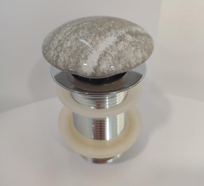 Grey marble pop-up for basin