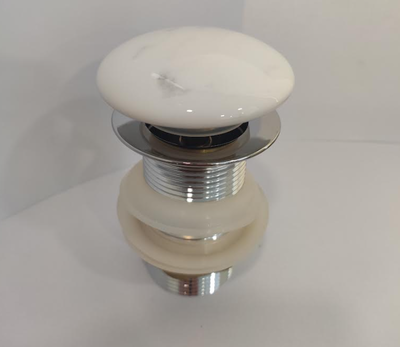 Carrara marble pop-up for basin