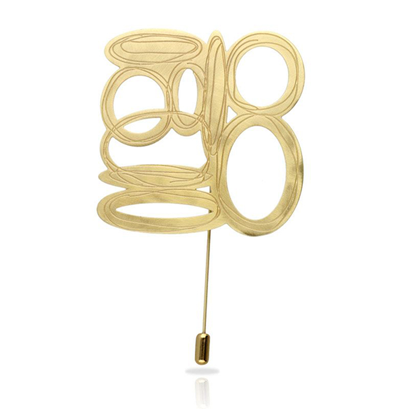 Opera gold brooch-null