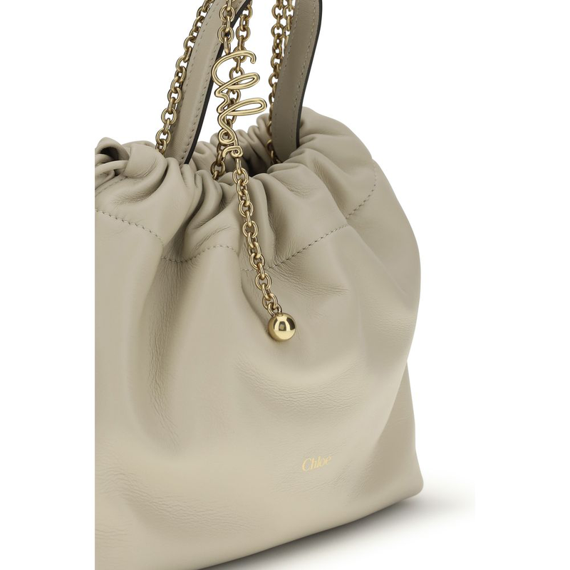 Beige lamb ovis aries aries shoulder bag-null