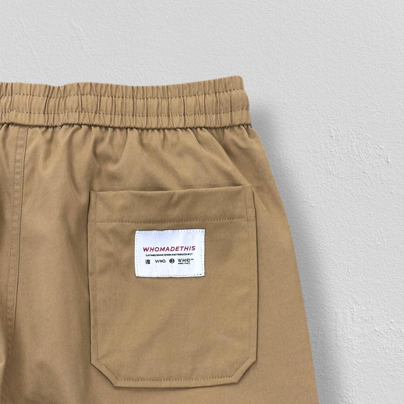 Elastic ankle cargo pants in beige-null
