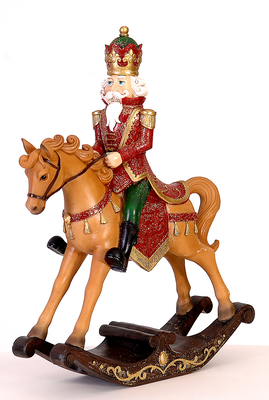 Polyresin red & green soldier sitting on a rocking horse, , medium